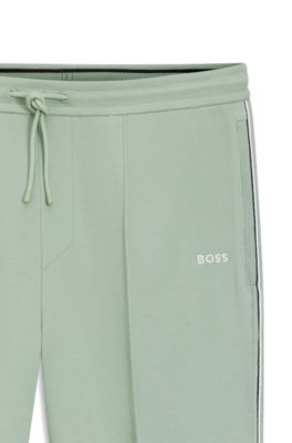 Piping-detail tracksuit bottoms in a cotton blend, Light Green