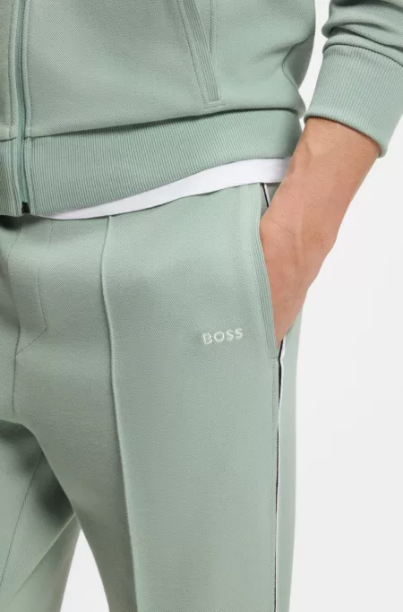 Piping-detail tracksuit bottoms in a cotton blend