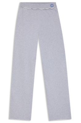 Pantalones de ch&aacute;ndal en felpa de algod&oacute;n con logo en la cintura, Gris claro