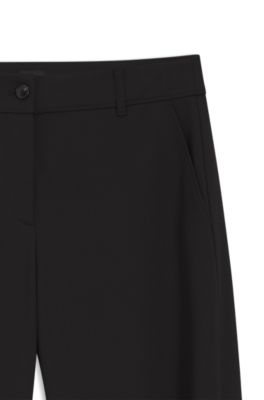 Pantalones con pernera de corte barril en sarga el&aacute;stica con dobladillos ajustables, Negro