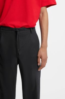 Pantalones de corte moderno en tejido otomano el&aacute;stico t&eacute;cnico, Negro