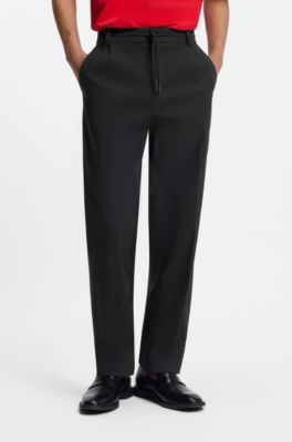 Pantalones de corte moderno en tejido otomano el&aacute;stico t&eacute;cnico, Negro