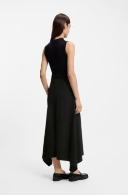 Pantalones relaxed fit con bajos asim&eacute;tricos, Negro