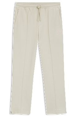 Cotton-blend tracksuit bottoms with tennis-themed logo