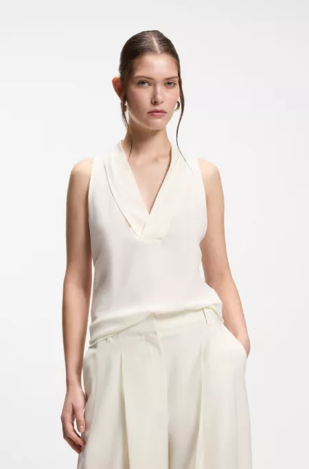 Sleeveless blouse in sandwashed silk with V neckline