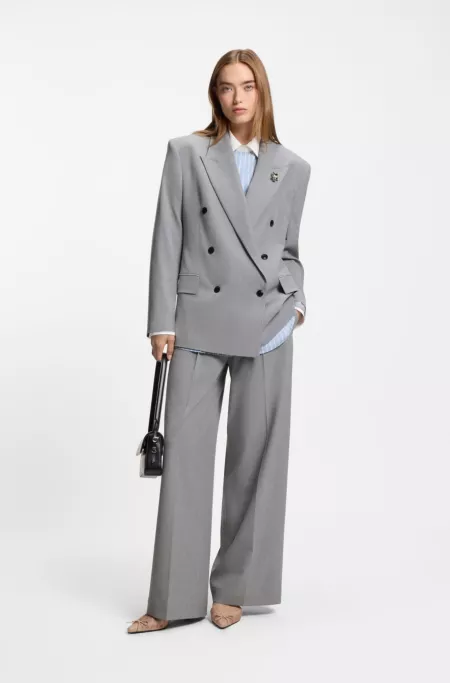 Relaxed-fit blazer with enamel flower brooch