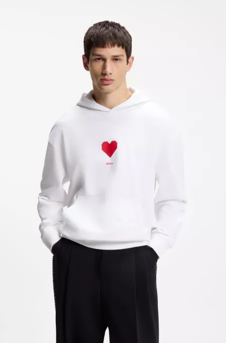 All-gender Cotton-terry hoodie with origami-heart artwork