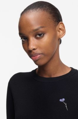 Cotton sweater with detachable floral brooch, Black