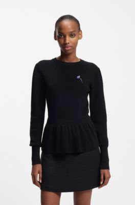 Pull en coton avec broche &agrave; fleurs amovible, Noir