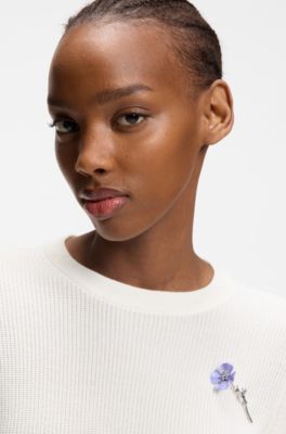 Jersey de algod&oacute;n con broche floral desmontable, Blanco