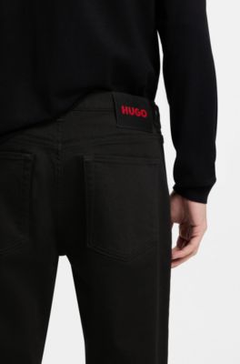 Jeans tapered fit de denim el&aacute;stico Stay Black, Negro