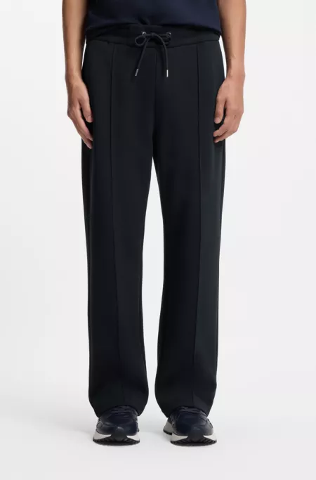 Drawcord-waist trousers in a regular fit