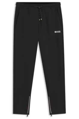 Stretch-gabardine tracksuit bottoms with zipped hems, Black