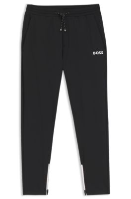 Stretch-gabardine tracksuit bottoms with zipped hems, Black