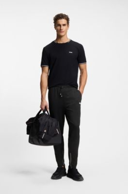 Stretch-gabardine tracksuit bottoms with zipped hems, Black