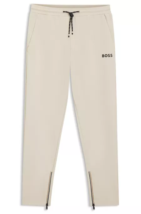 Active Stretch-gabardine tracksuit bottoms with zipped hems