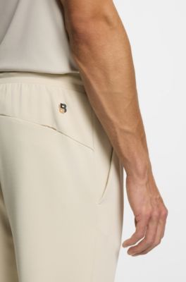 Active Bas de surv&ecirc;tement en gabardine stretch avec ourlets zipp&eacute;s, Beige clair