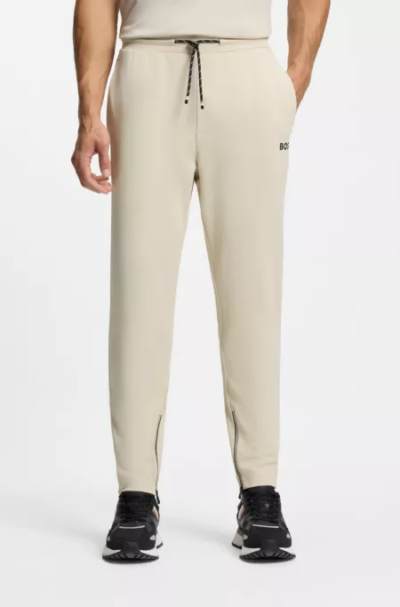 Stretch-gabardine tracksuit bottoms with zipped hems