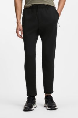 Reflective-detail tracksuit bottoms in a regular fit, Black
