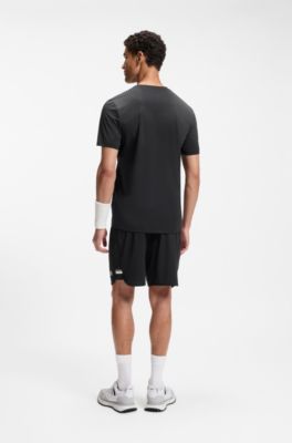 Active Camiseta slim fit de secado r&aacute;pido con detalles reflectantes, Negro