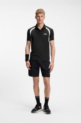 Active Polo slim fit en tejido el&aacute;stico de secado r&aacute;pido, Negro