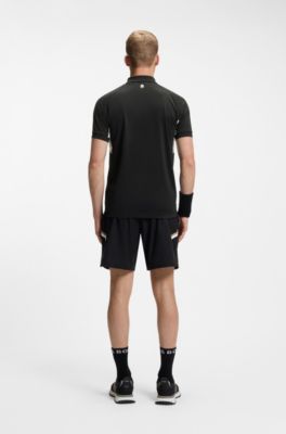 Active Polo slim fit en tejido el&aacute;stico de secado r&aacute;pido, Negro