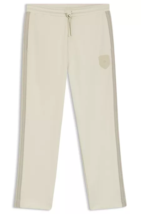 Crest-logo tracksuit bottoms in a regular fit