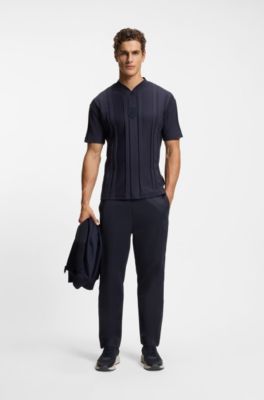 Pantalones de ch&aacute;ndal regular fit con escudo con logo, Azul oscuro
