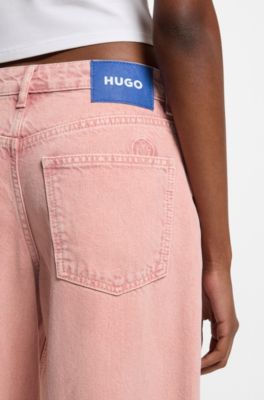 Jeans loose fit en denim rosa con bajos deshilachados, Rosa claro