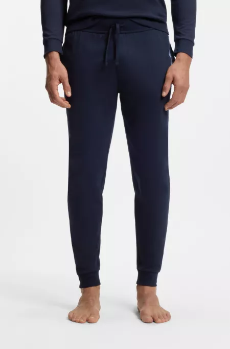 Cotton-terry tracksuit bottoms with logo and stripes