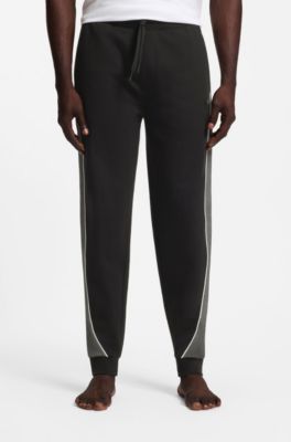 Pantalones de ch&aacute;ndal de piqu&eacute; de algod&oacute;n con ribetes en contraste, Negro