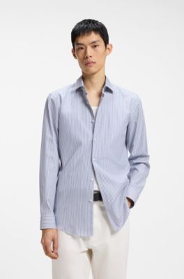 Camisa slim fit en algod&oacute;n Oxford con pu&ntilde;os cl&aacute;sicos, Celeste