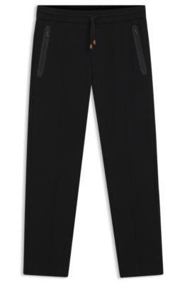 Cotton-blend tracksuit bottoms in a regular fit, Black