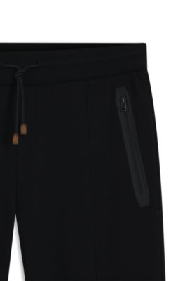 Cotton-blend tracksuit bottoms in a regular fit, Black
