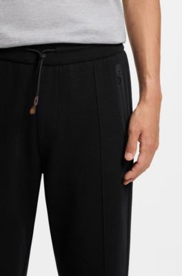 Cotton-blend tracksuit bottoms in a regular fit, Black