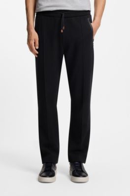 Cotton-blend tracksuit bottoms in a regular fit, Black