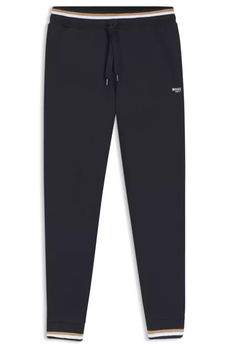 Cotton-terry tracksuit bottoms with signature stripes and logo