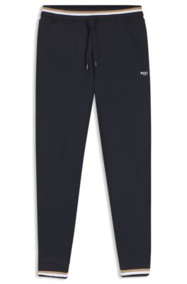 Cotton-terry tracksuit bottoms with signature stripes and logo, Black