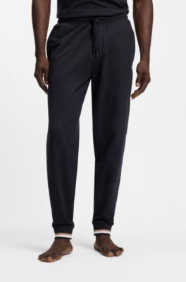 Cotton-terry tracksuit bottoms with signature stripes and logo, Black