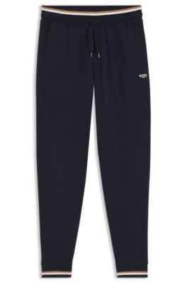 Cotton-terry tracksuit bottoms with signature stripes and logo, Dark Blue