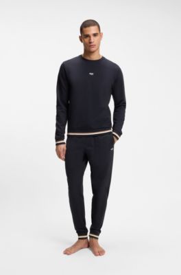 Pantalones de ch&aacute;ndal en felpa de algod&oacute;n con logo y rayas de la marca, Azul oscuro