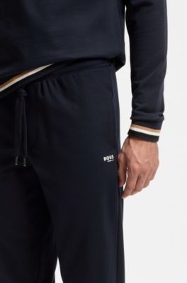 Cotton-terry tracksuit bottoms with signature stripes and logo, Dark Blue