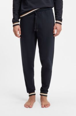 Cotton-terry tracksuit bottoms with signature stripes and logo, Dark Blue
