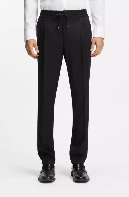 Slim-fit trousers in twill fabric
