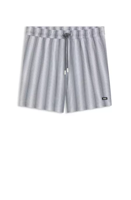 Logo-badge swim shorts with stripe