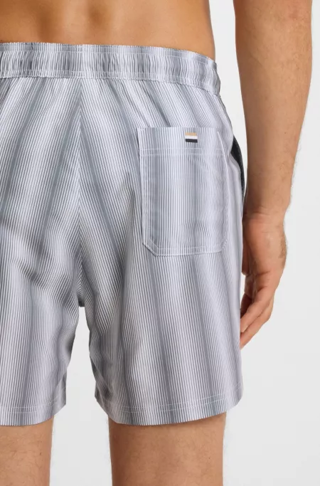 Logo-badge swim shorts with stripe
