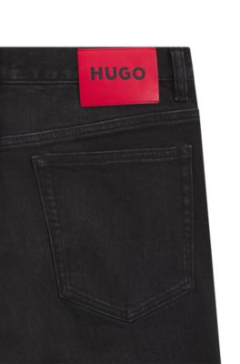 Jeans slim fit de denim el&aacute;stico negro, Gris oscuro