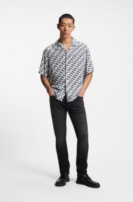 Jeans slim fit de denim el&aacute;stico negro, Gris oscuro