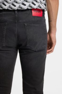 Jeans slim fit de denim el&aacute;stico negro, Gris oscuro