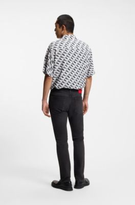 Jeans slim fit de denim el&aacute;stico negro, Gris oscuro
